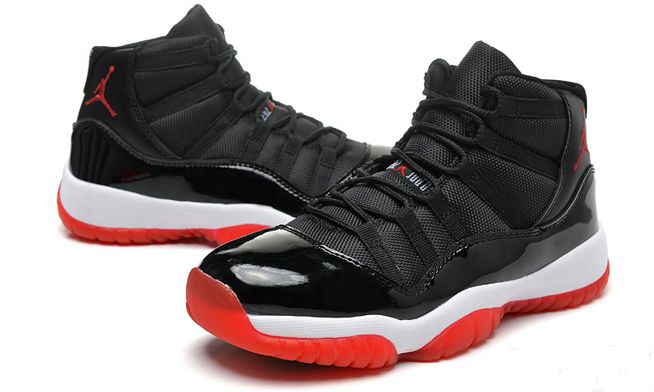 black and red jordan 11's